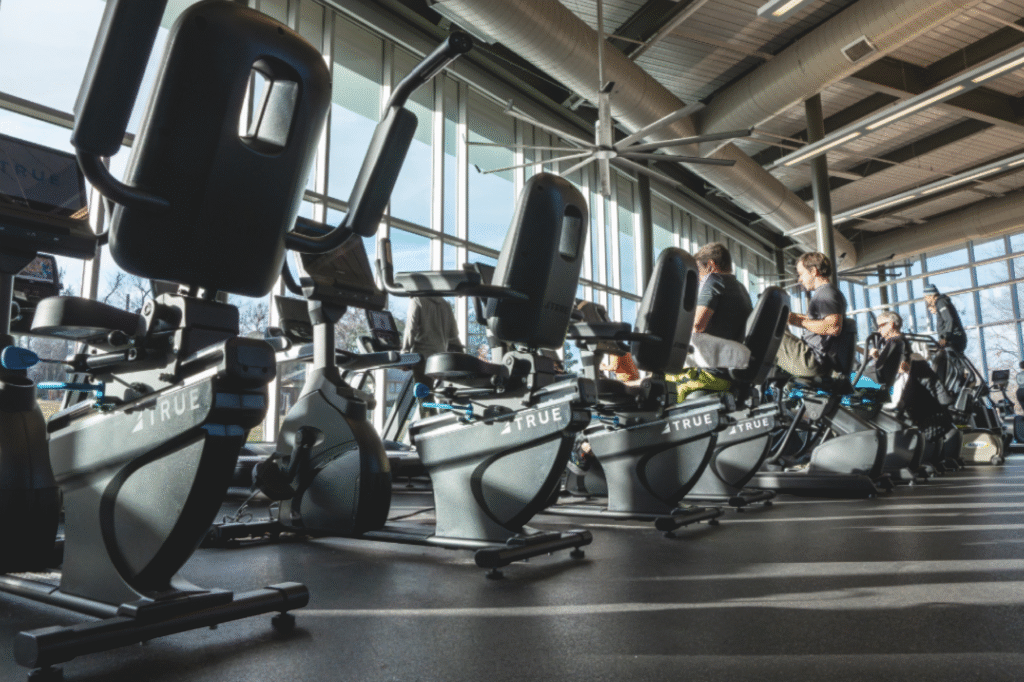 TRUE recumbent bikes in a commercial gym maintained through FASTCARE services.
